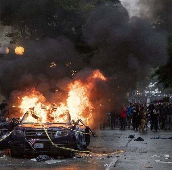 Seattle cop car on fire during protest 30 May 2020